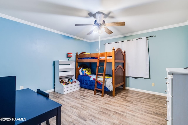 938 Marteau Rd, Broussard, LA 70518 - bedroom featuring baseboards, crown molding, wood finished floors, and a ceiling fan