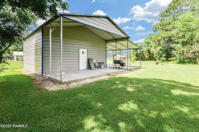 938 Marteau Rd, Broussard, LA 70518 - rear view of property featuring a patio area and a yard