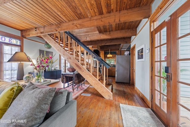3000 E Simcoe St, Lafayette, LA 70501 - living area featuring a wood ceiling with exposed beams, french doors, stairway, and wood-type flooring