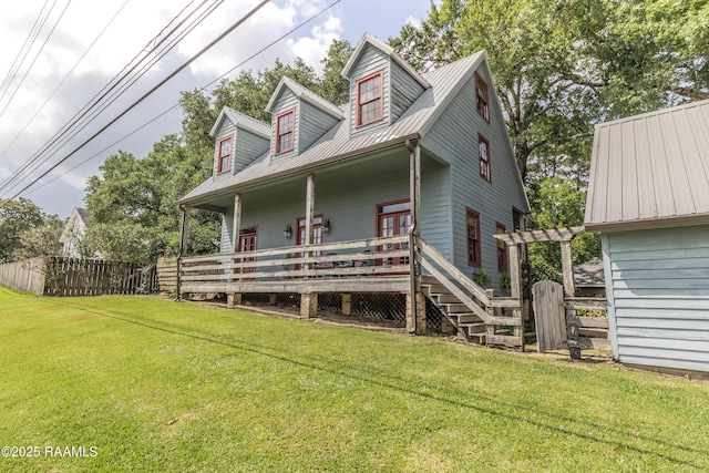 3000 E Simcoe St, Lafayette, LA 70501 - cape cod house featuring metal roof and a wooden deck