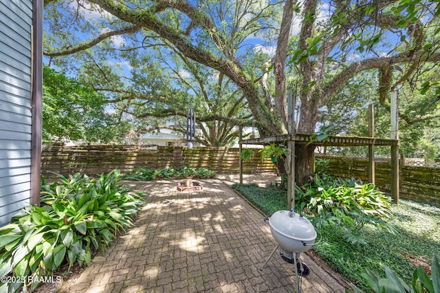 3000 E Simcoe St, Lafayette, LA 70501 - fenced backyard featuring a patio