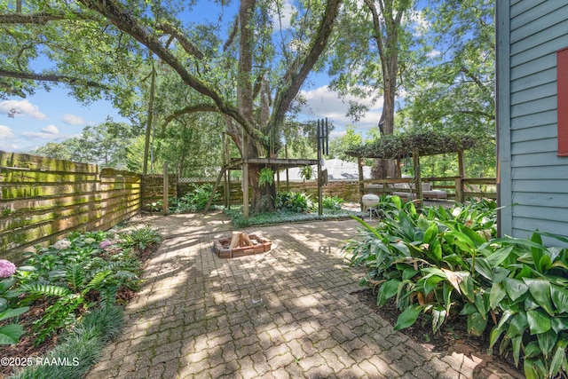 3000 E Simcoe St, Lafayette, LA 70501 - fenced backyard with a patio