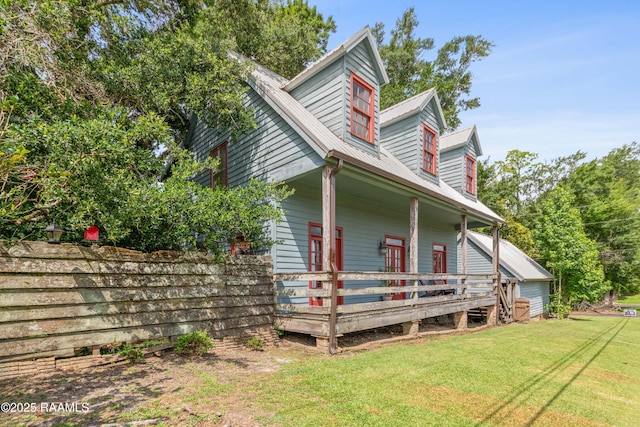 3000 E Simcoe St, Lafayette, LA 70501 - view of front of house featuring a front yard and a deck