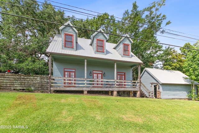 3000 E Simcoe St, Lafayette, LA 70501 - cape cod-style house with a front yard and french doors