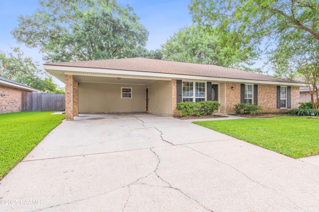 315 Orgeron Dr, Lafayette, LA 70506 - ranch-style home with driveway, brick siding, and a carport