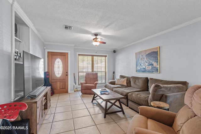 315 Orgeron Dr, Lafayette, LA 70506 - living area with a ceiling fan, ornamental molding, light tile patterned flooring, and a textured ceiling