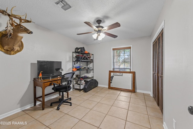 315 Orgeron Dr, Lafayette, LA 70506 - office area featuring ceiling fan, a textured ceiling, and light tile patterned flooring
