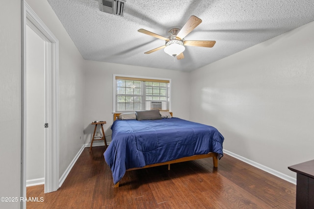 315 Orgeron Dr, Lafayette, LA 70506 - bedroom featuring wood finished floors, a textured ceiling, and ceiling fan