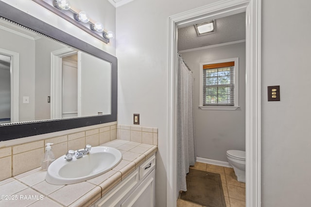 315 Orgeron Dr, Lafayette, LA 70506 - full bathroom with vanity, crown molding, tile patterned floors, and backsplash