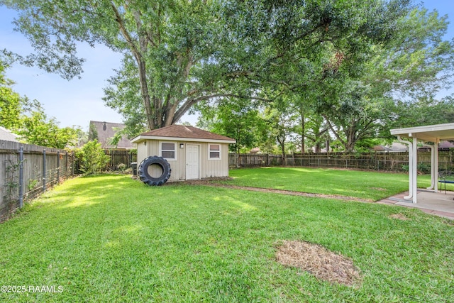 315 Orgeron Dr, Lafayette, LA 70506 - fenced backyard with a storage unit and a patio area