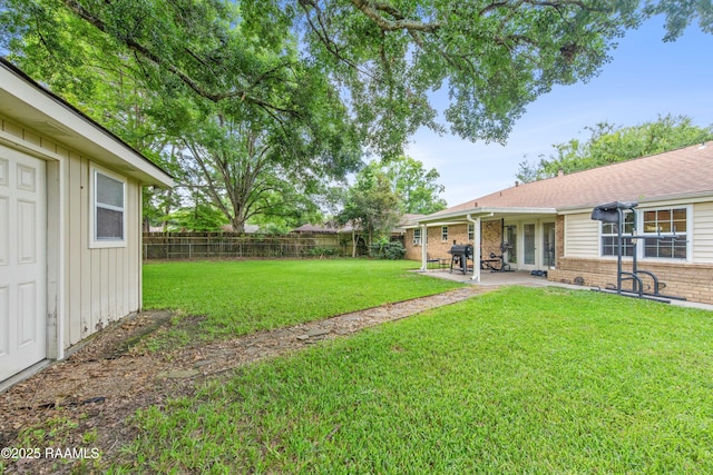 315 Orgeron Dr, Lafayette, LA 70506 - fenced backyard with a patio