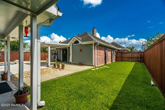 202 Doe Ln, Broussard, LA 70518 - fenced backyard featuring a patio