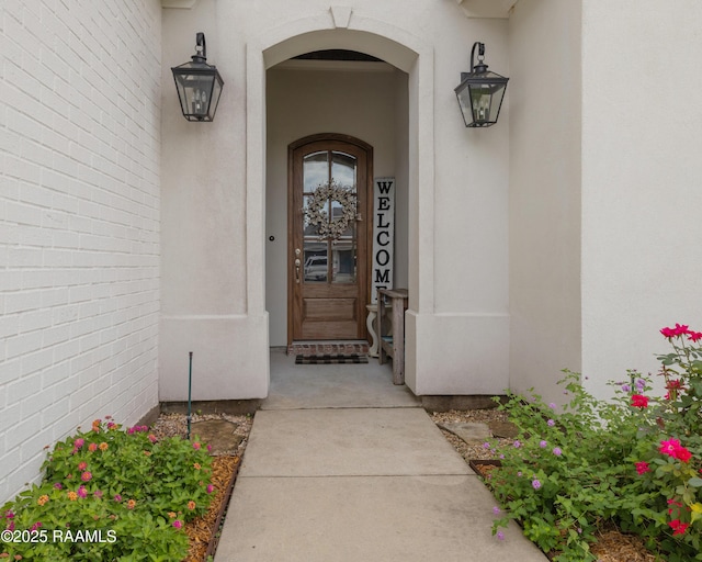 302 Easy Rock Landing Dr, Broussard, LA 70518 - doorway to property with stucco siding