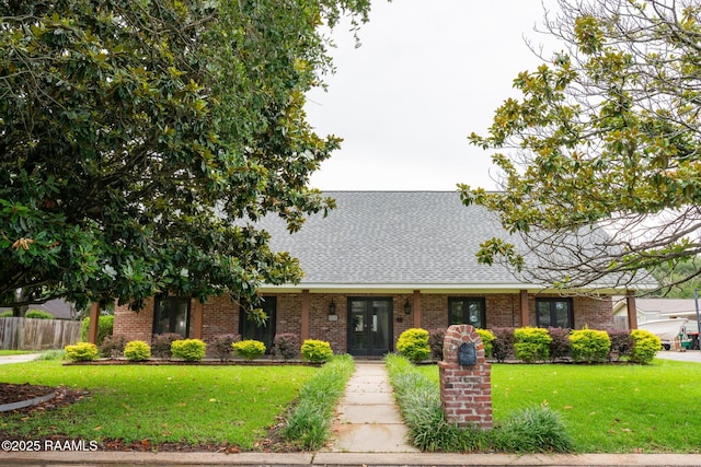 513 Robert Lee Cir, Lafayette, LA 70506 - view of front of house with brick siding and roof with shingles