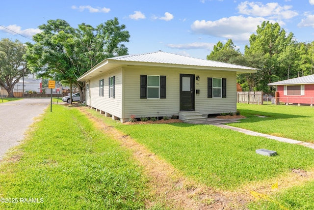 708 Park Ave, Breaux Bridge, LA 70517 - view of front of home featuring a metal roof and entry steps