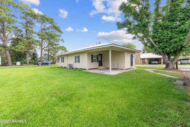 708 Park Ave, Breaux Bridge, LA 70517 - rear view of property featuring a yard and a patio
