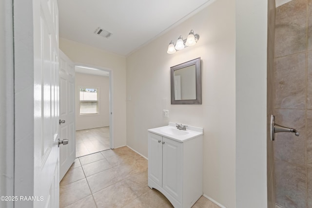 708 Park Ave, Breaux Bridge, LA 70517 - bathroom with vanity, ornamental molding, and tile patterned flooring