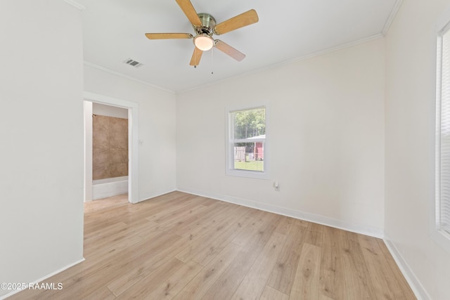 708 Park Ave, Breaux Bridge, LA 70517 - unfurnished room with light wood-style floors, ceiling fan, and ornamental molding