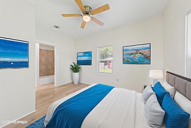 708 Park Ave, Breaux Bridge, LA 70517 - bedroom featuring wood finished floors, ornamental molding, and ceiling fan