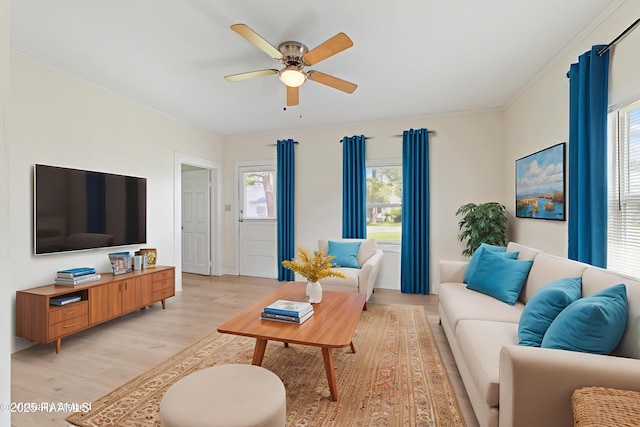 708 Park Ave, Breaux Bridge, LA 70517 - living area featuring light wood-style flooring, a ceiling fan, and ornamental molding