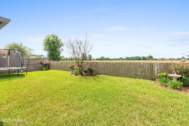 236 Whispering Meadows Rd, Broussard, LA 70518 - fenced backyard featuring a trampoline