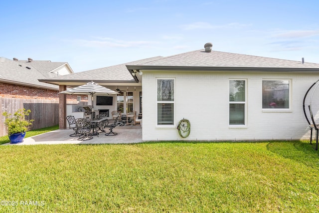 236 Whispering Meadows Rd, Broussard, LA 70518 - rear view of property with a patio area, a shingled roof, and brick siding