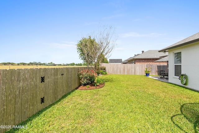 236 Whispering Meadows Rd, Broussard, LA 70518 - fenced backyard with a patio area
