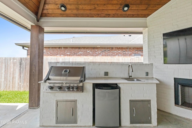 236 Whispering Meadows Rd, Broussard, LA 70518 - view of patio / terrace featuring a sink and exterior kitchen