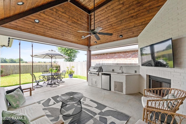 236 Whispering Meadows Rd, Broussard, LA 70518 - fenced backyard featuring outdoor dining area, exterior kitchen, a patio area, and ceiling fan