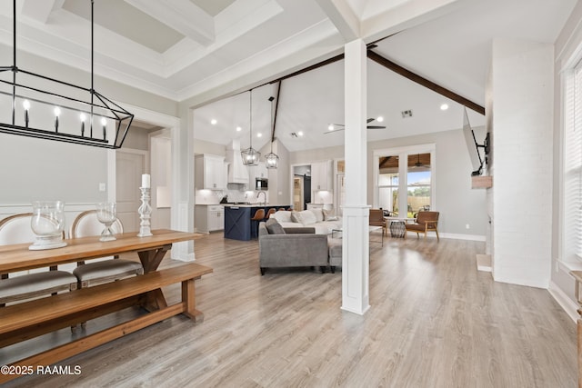 236 Whispering Meadows Rd, Broussard, LA 70518 - living room with beamed ceiling, a chandelier, a towering ceiling, light wood finished floors, and recessed lighting