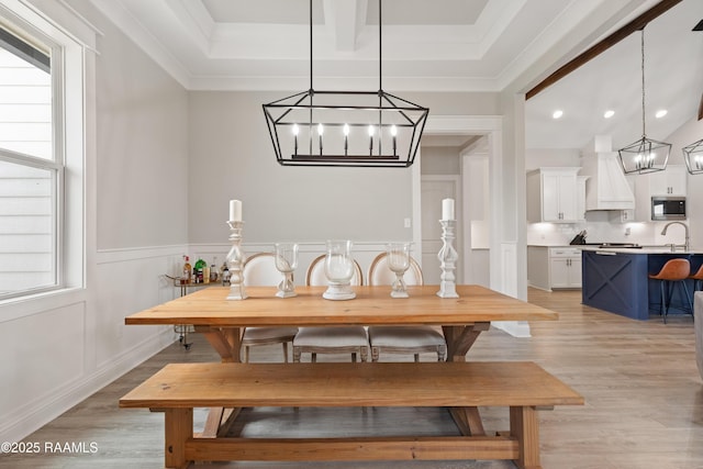 236 Whispering Meadows Rd, Broussard, LA 70518 - dining space featuring a chandelier, light wood-style floors, recessed lighting, a wainscoted wall, and a decorative wall
