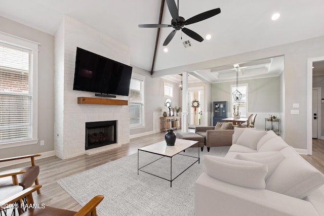 236 Whispering Meadows Rd, Broussard, LA 70518 - living area featuring plenty of natural light, ceiling fan, wood finished floors, recessed lighting, and a large fireplace