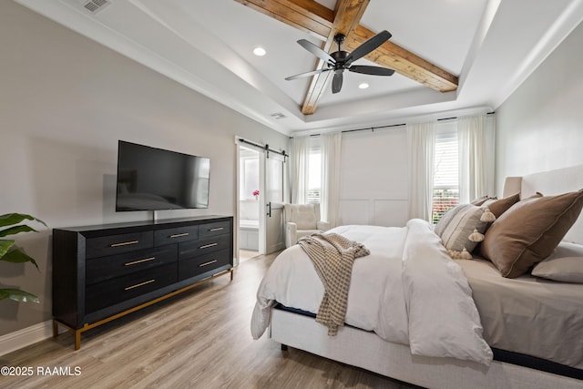 236 Whispering Meadows Rd, Broussard, LA 70518 - bedroom with light wood-type flooring, a barn door, recessed lighting, ensuite bath, and ceiling fan