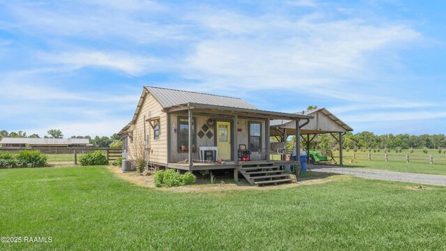 145 Celestine Ln, Sunset, LA 70584 - view of front facade featuring a metal roof and a deck