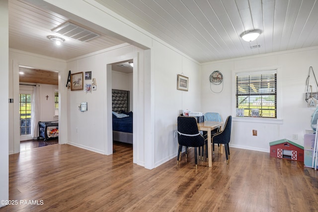 145 Celestine Ln, Sunset, LA 70584 - dining space with crown molding, wood finished floors, and wooden ceiling