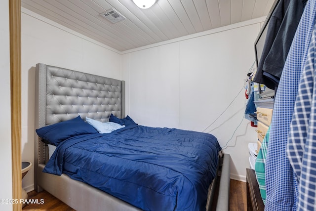 145 Celestine Ln, Sunset, LA 70584 - bedroom with wood finished floors and wood ceiling