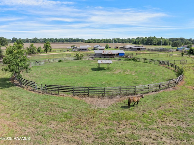 145 Celestine Ln, Sunset, LA 70584 - view of green lawn featuring a view of countryside, an exterior structure, and an outdoor riding arena