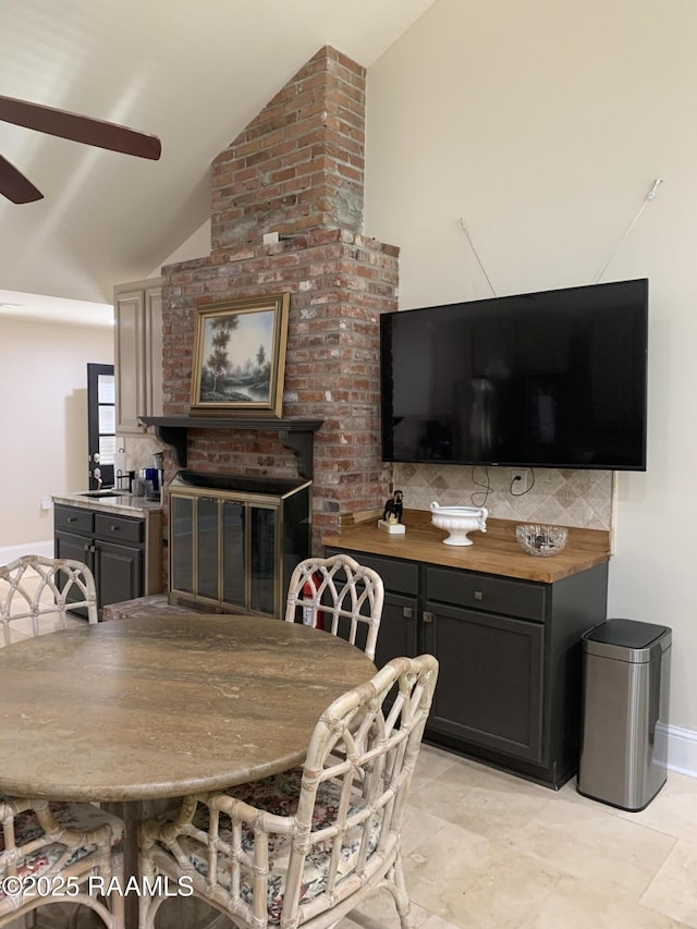 1921 E Willow St, Lafayette, LA 70501 - dining room with lofted ceiling and ceiling fan