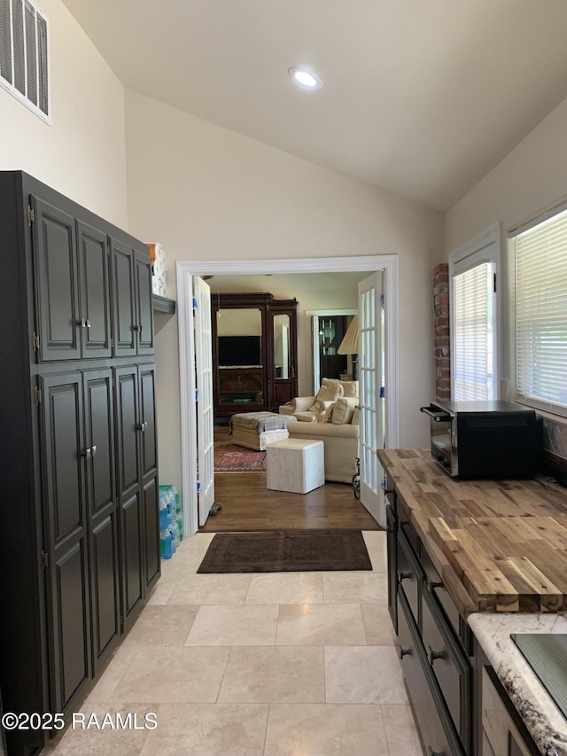 1921 E Willow St, Lafayette, LA 70501 - bathroom with vaulted ceiling and recessed lighting