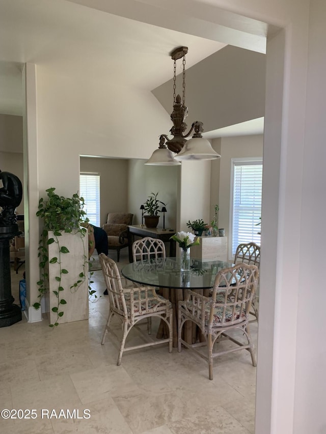 1921 E Willow St, Lafayette, LA 70501 - dining room with healthy amount of natural light and lofted ceiling