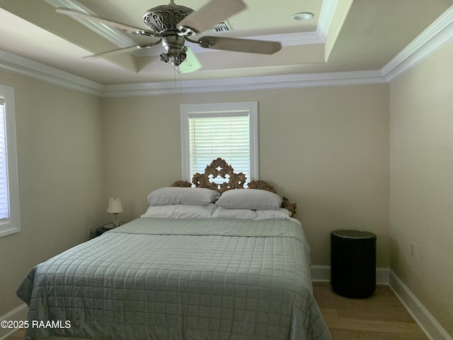 1921 E Willow St, Lafayette, LA 70501 - bedroom with a tray ceiling, ornamental molding, and a ceiling fan