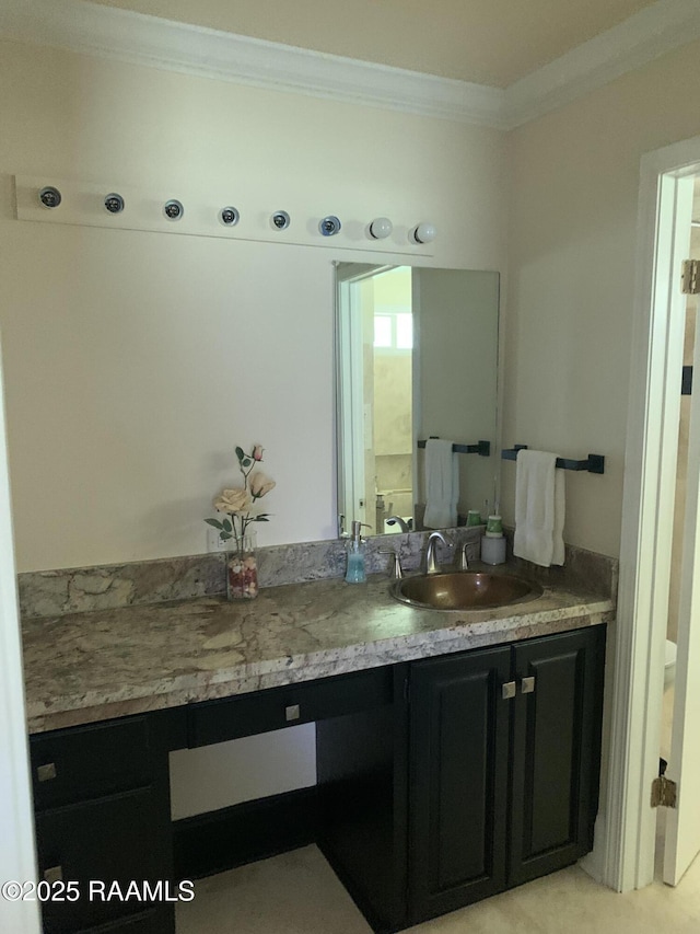 1921 E Willow St, Lafayette, LA 70501 - bathroom with crown molding and vanity