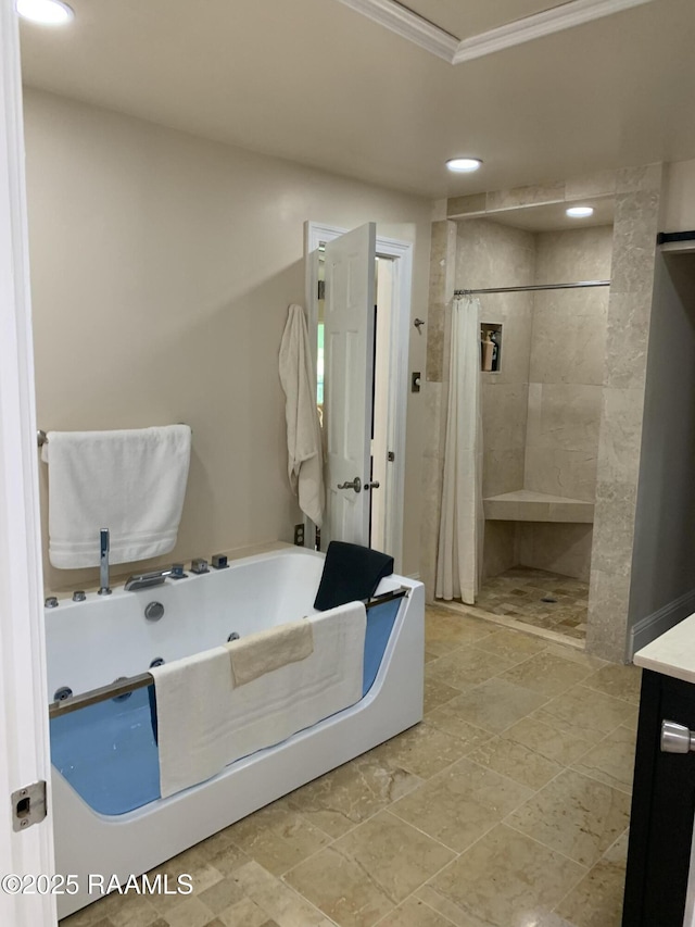 1921 E Willow St, Lafayette, LA 70501 - full bath featuring tiled shower, a jetted tub, vanity, ornamental molding, and recessed lighting