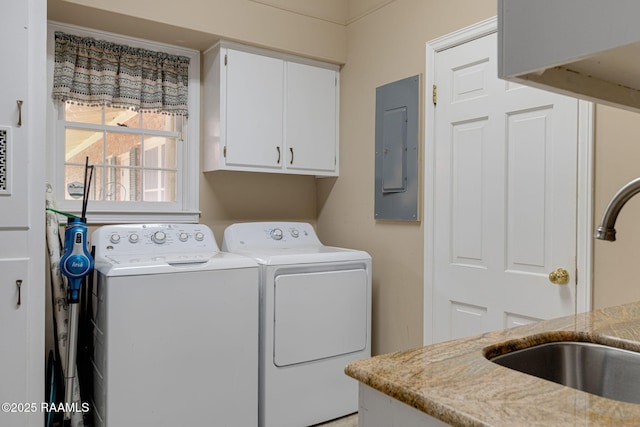 313 Darby Ln, New Iberia, LA 70560 - washroom with cabinet space, electric panel, and independent washer and dryer