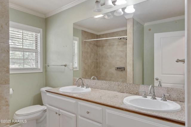 301 Broadmoor Blvd, Lafayette, LA 70503 - full bathroom featuring double vanity, a tile shower, and crown molding