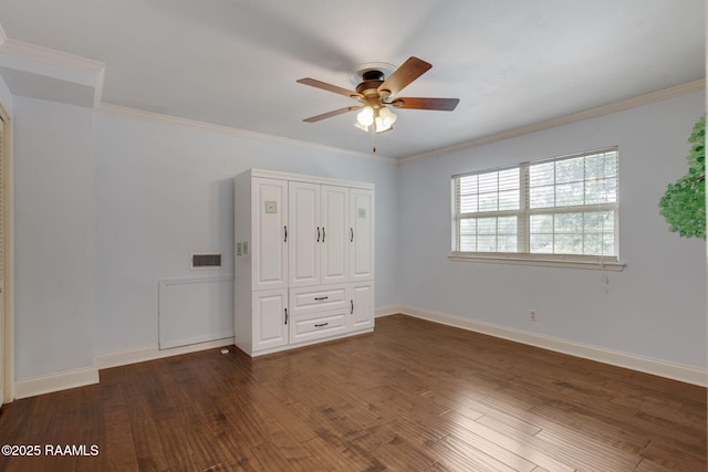 301 Broadmoor Blvd, Lafayette, LA 70503 - unfurnished bedroom featuring wood finished floors, crown molding, a ceiling fan, and a closet