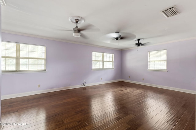 301 Broadmoor Blvd, Lafayette, LA 70503 - unfurnished room featuring ceiling fan, plenty of natural light, ornamental molding, and wood finished floors