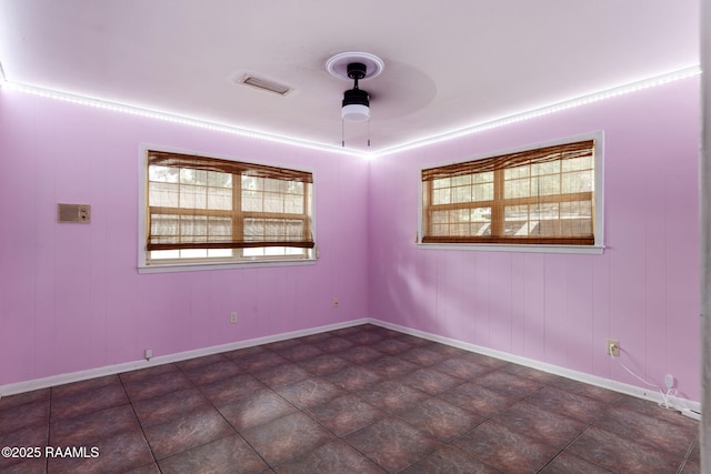 301 Broadmoor Blvd, Lafayette, LA 70503 - unfurnished room with plenty of natural light and ceiling fan