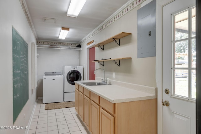 301 Broadmoor Blvd, Lafayette, LA 70503 - laundry room featuring electric panel, washer and dryer, light tile patterned floors, and cabinet space