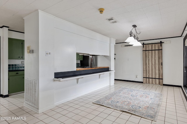301 Broadmoor Blvd, Lafayette, LA 70503 - unfurnished living room featuring a barn door, crown molding, light tile patterned floors, and a chandelier